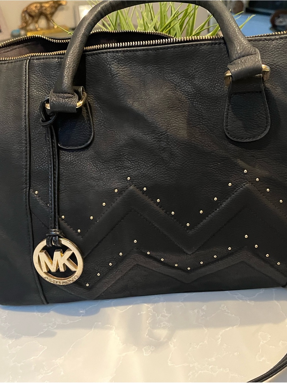 Black Chevron-Quilted Satchel with Gold Charm